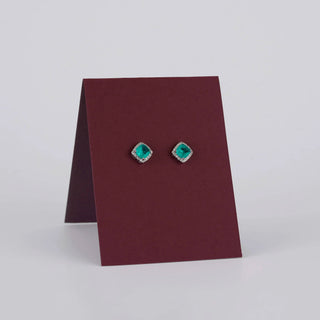 Emerald Oval Halo Stud Earrings