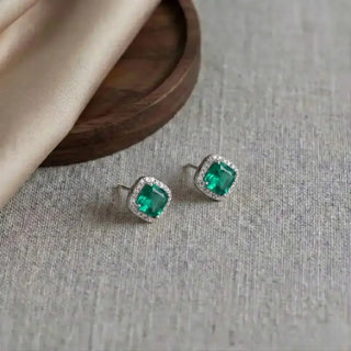 Emerald Oval Halo Stud Earrings