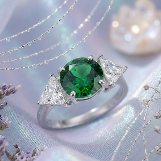 Emerald Glow Three‑Stone Ring