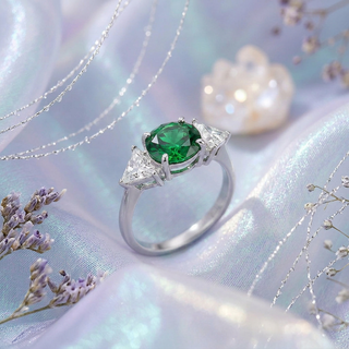 Emerald Glow Three‑Stone Ring