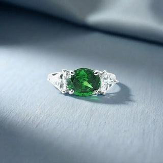 Emerald Glow Three‑Stone Ring